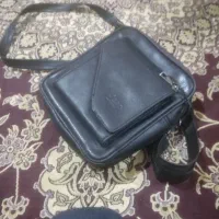 کیف قهوه‌ای گمشده