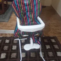 صندلی غذا کودک و مقداری وسایل بچه فروش