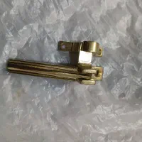 دستگیره پنجره طلایی، جنس برنز