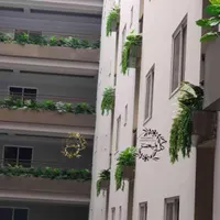 تزیین گل وگیاه مصنوعی برای نمای ساختمان
