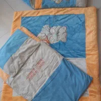 ست تشک بالش لحاف وقنداق فرنگی یاکیسه خواب) نوزاد