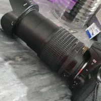 دوربین عکاسی و فیلم برداری با لنز حرفه ای