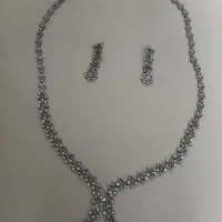 سرویس نقره  تمام تراشه ..نگین نیست وزن ۲۱ گرمس