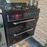 اجاق گاز شیشه ای و جادار