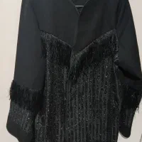 تعدادی مانتو و پالتو و پارچه جهت معاوضه یا فروش