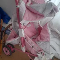 کالسکه وساعت دیواری