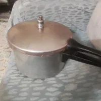 زود پز چدنی|ظروف پخت‌وپز|اصفهان, کوی ولی عصر|دیوار