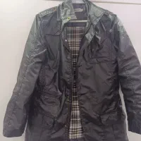 کاپشن طرح چرم