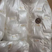 کاپشن براق سفید مدل BUY