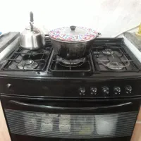 گاز پنج شعله با میز صندلی