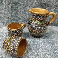 نقطه کوبی بر روی اشیا سفالی