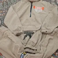 لباس بچه گانه وپوتین در حد نو