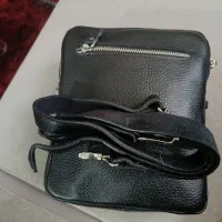 کیف دوشی  معاوضه با پرنده یا ابزار