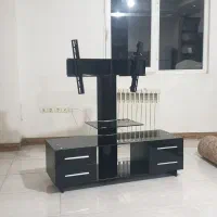 میز تلویزیون شیشه ای براکت دار