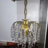 یک جفت لوستر برنجی شیک یک عددروشویی