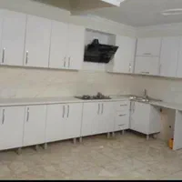 کابینت بدنه فلزی درب چوبی رنگ بندی داره