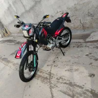 تریل پرواز و موتور سیکلت اسپرت