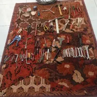 تعداد زیادی اچار و سیم سیار
