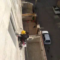 پیچ و رول پلاک نما عایق ابندی بدون داربست با طناب|خدمات پیشه و مهارت|اهواز, زیتون کارمندی|دیوار