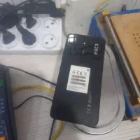 گوشی پوکو c65 با شارژر