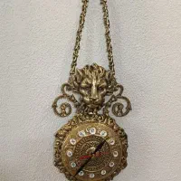 ساعت دیواری برنزی