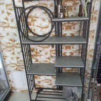 قفسه ایستاده با قوطی