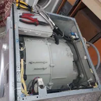 تعمیرات تخصصی ماشین لباسشویی با یک سال ضمانت کتبی