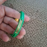 دستبند چرم و طلا