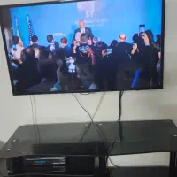 میز تلویزیون شیشه ای