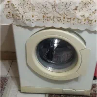 لباس شویی صنام|ماشین لباسشویی و خشک‌کن لباس|رشت, منظریه|دیوار