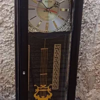 ساعت دیواریو ایستاده