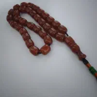 تسبیح سندلوس کهربا ۳۳ عدد