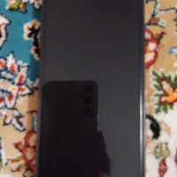 گوشی شیاعومی درحد نو به رنگ مشکی کاربونی