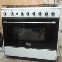 گاز پنج شعله و میز تلویزیون