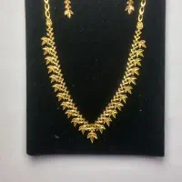 نیمست طلا، گوشواره ،گردنبند طرح تراش