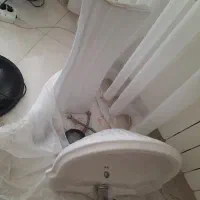 روشویی همراه با شیر آب