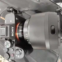 دوربین سونی آلفا سون فور بهمراه لنز ۸۵سیگما