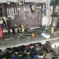 شاگرد مکانیک صافکار باتریساز