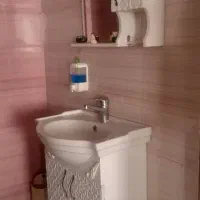 روشویی کمد و شیر آب