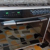 اجاق گاز طرح فر صفحه استیل در حد نو