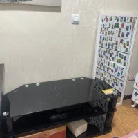 میز تیوی تمام شیشه ترک