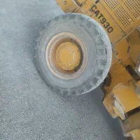 لاستیک لودر|خودرو سنگین|شیراز, گل سرخ|دیوار