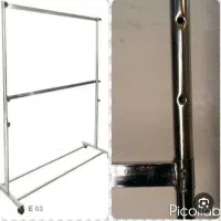 تعدادی رگال فروشگاهی  (لباس)تیله ای ،چوب لباسی