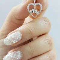 مدال نقره روکش طلا لاو کم اجرت silver rezazadeh