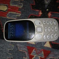 یک عدد گوشی ساده دوربین دار صفحه رنگی