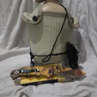 لوازم شکار چاقو استتاری قمقمه آب سوت نجات چند کاره