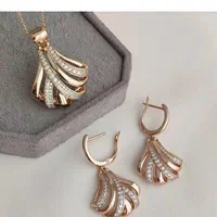 نیم ست ژوپینگ طرح طلا گوشواره گردنبند