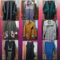 تعدادی مانتو و پیراهن مجلسی