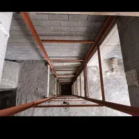 نصب اهنکشی درب ریل اسانسور