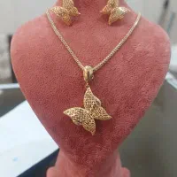 مدال وگوشواره پروانه ریخته  درحد نو